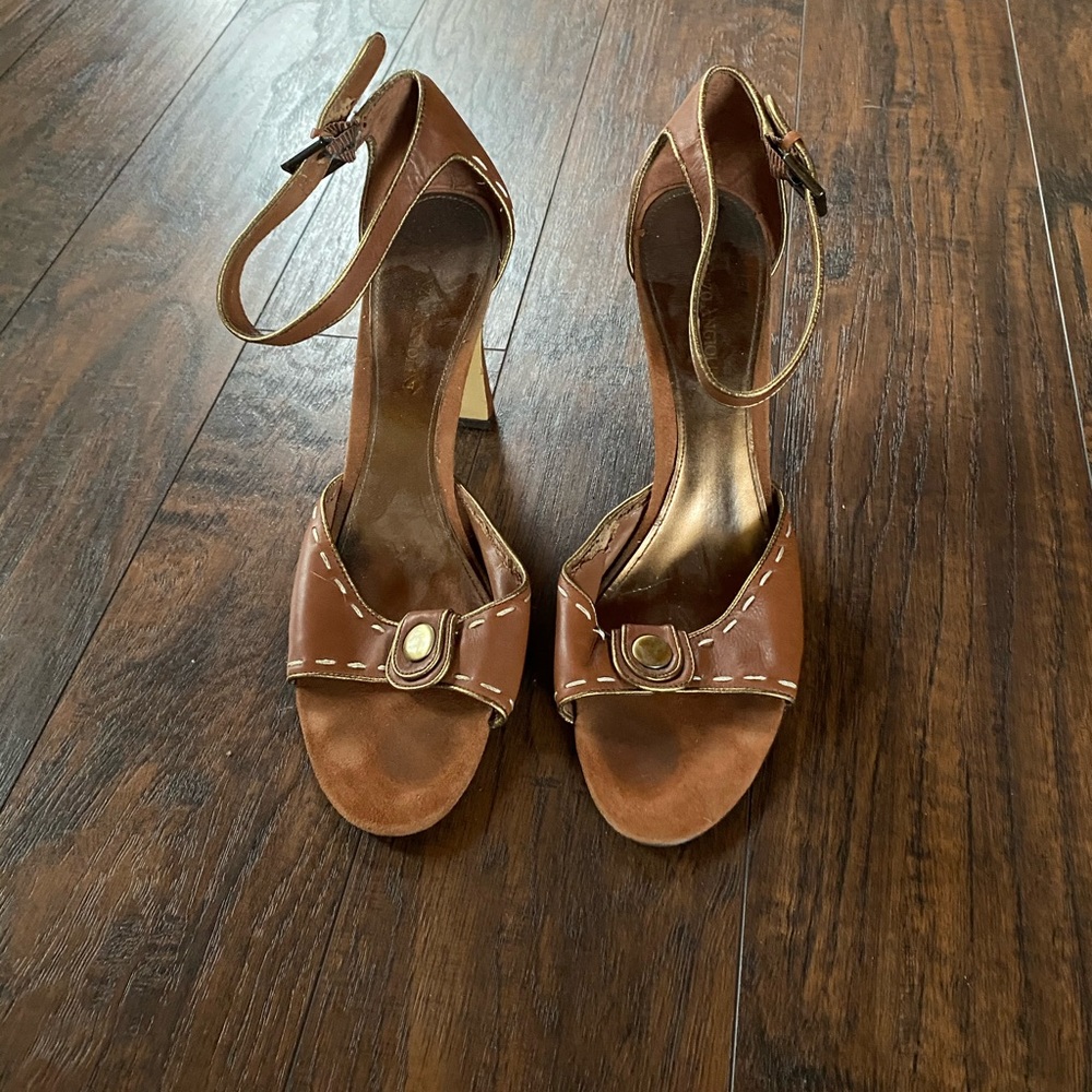 Tan block heels. Gold accents and stitching.